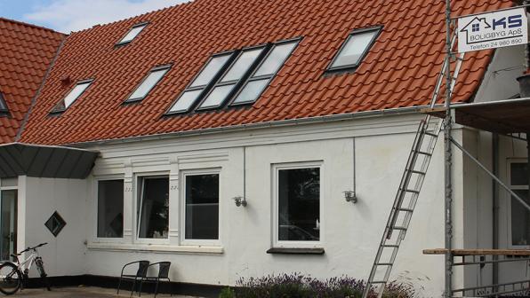 Case om træpillefyr, nye vinduer og isolering af loft og mure, Sønderborg